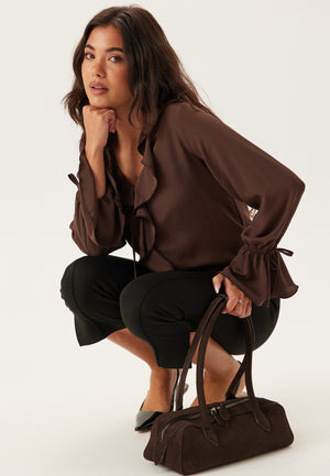 Frill Tie Bluse