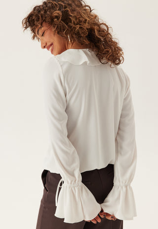 Frill Tie Bluse