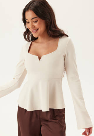 Long Sleeve Peplum Top