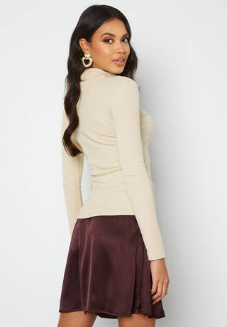 Sarika Turtleneck Top