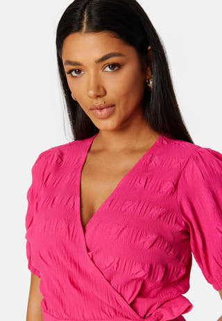 Triniti ss wrap blouse