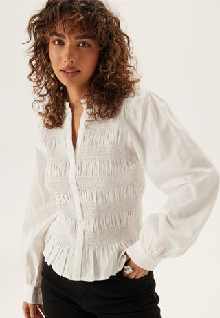 V-hals bomullssmocket bluse