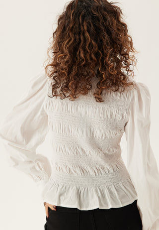 V-hals bomullssmocket bluse