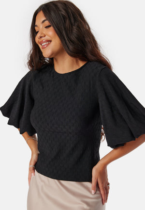 Bluse med voluminøse ermer