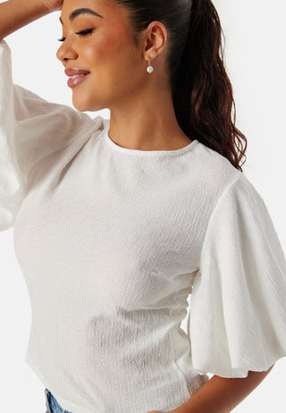 Bluse med voluminøse ermer