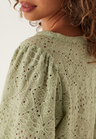 Bluse med voluminøse ermer og knapper