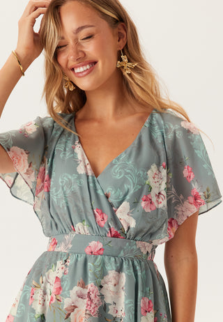 Blomstrete Maxi Kjole med Volanger