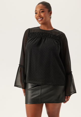 Bluse med volangerm