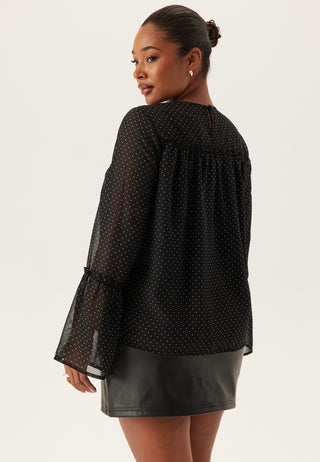 Bluse med volangerm
