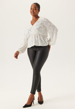 Push-up coated slim bukser